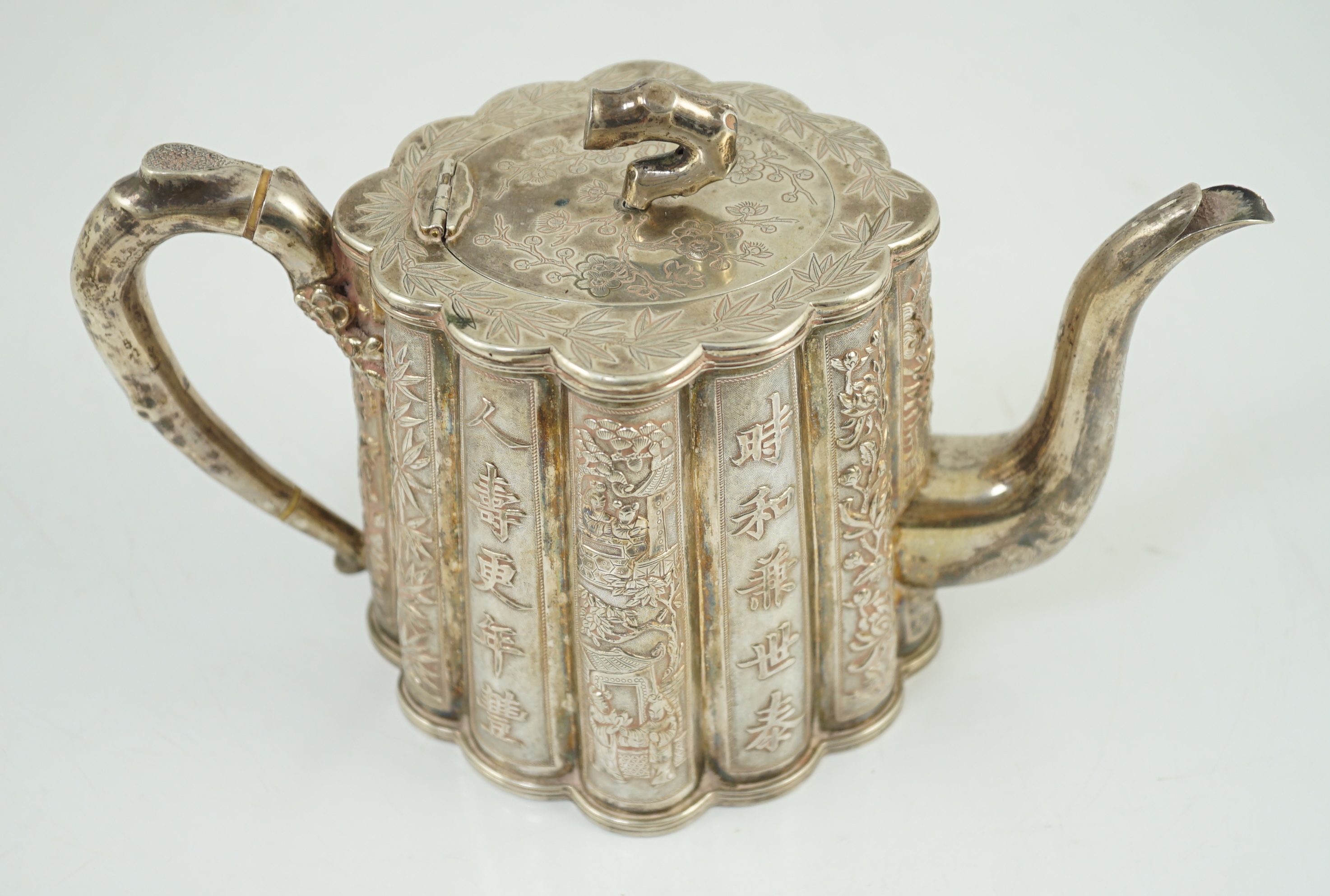 A late 19th/early 20th century Chinese Export silver teapot, by Luen Wo, Shanghai